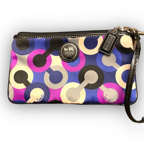 Coach Handbags - Coach silk material used clutch, in excellent condition